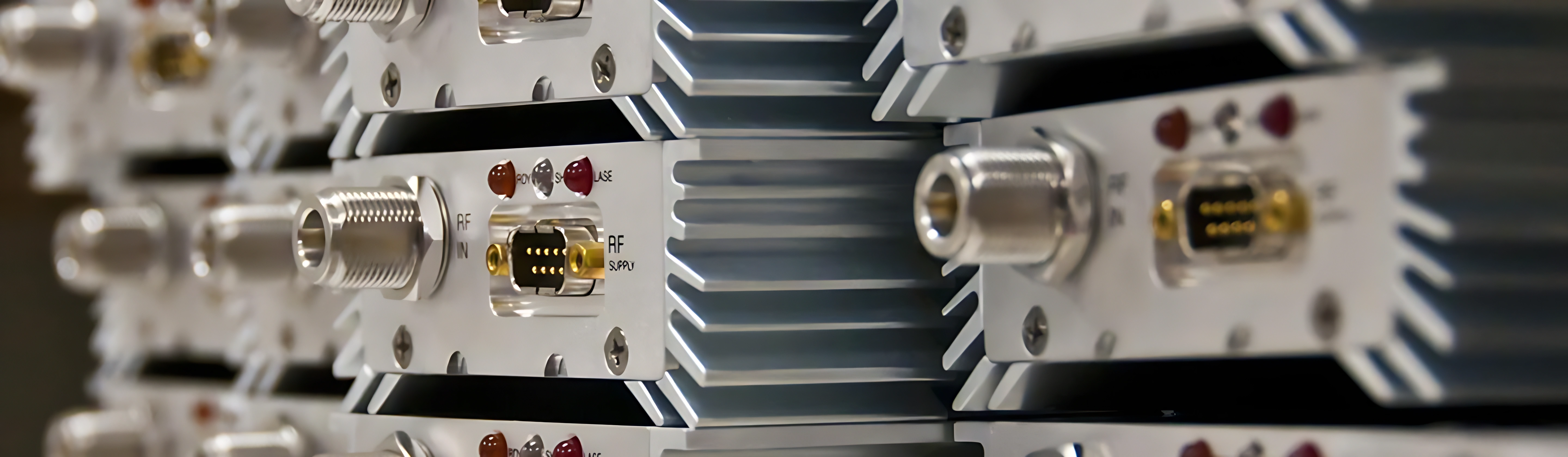 Electronic modules with heat sinks on a test rack